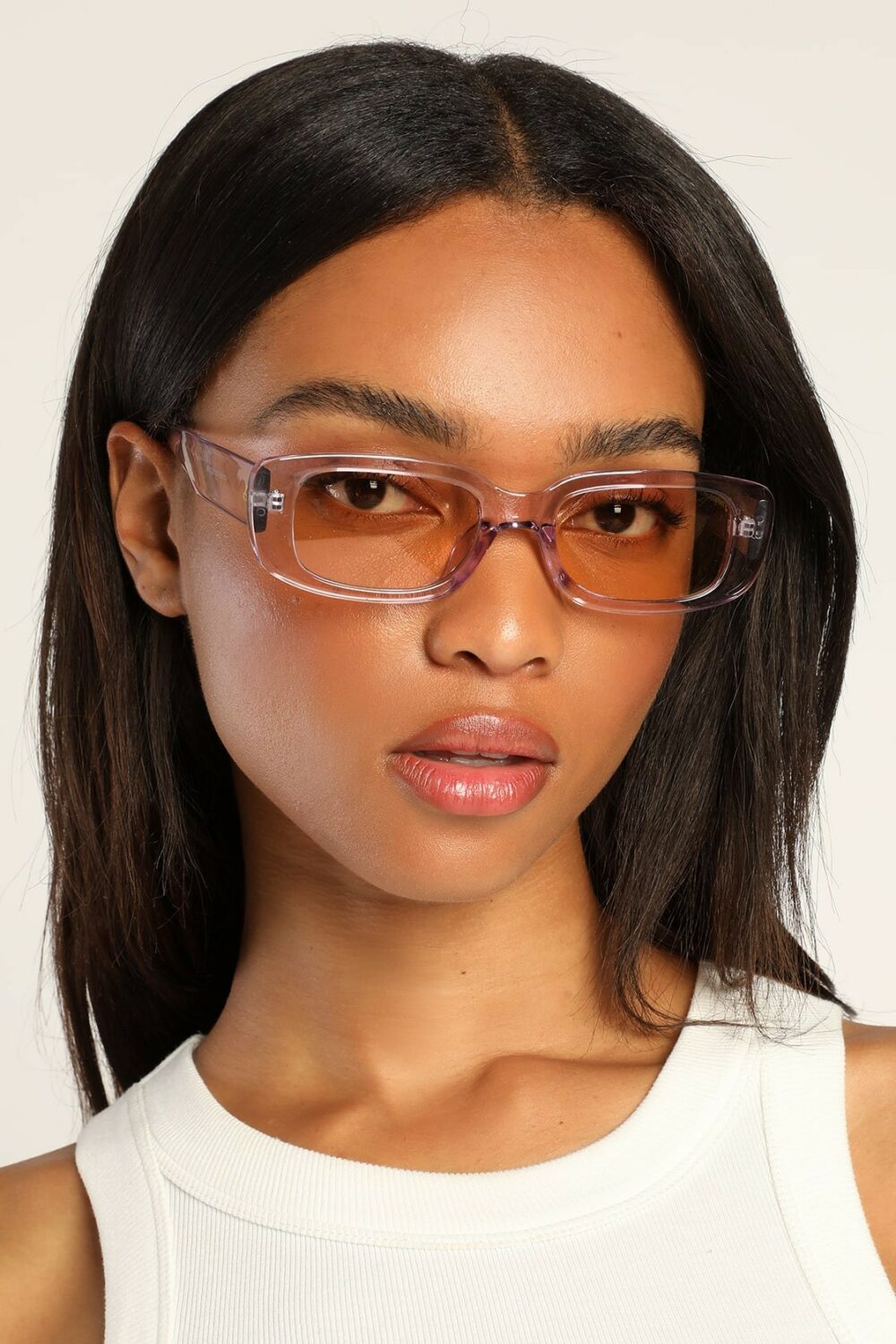These stylish Ceres V Lilac Rectangular Sunglasses include brown lenses and lilac rectangular frames making them ideal for women.