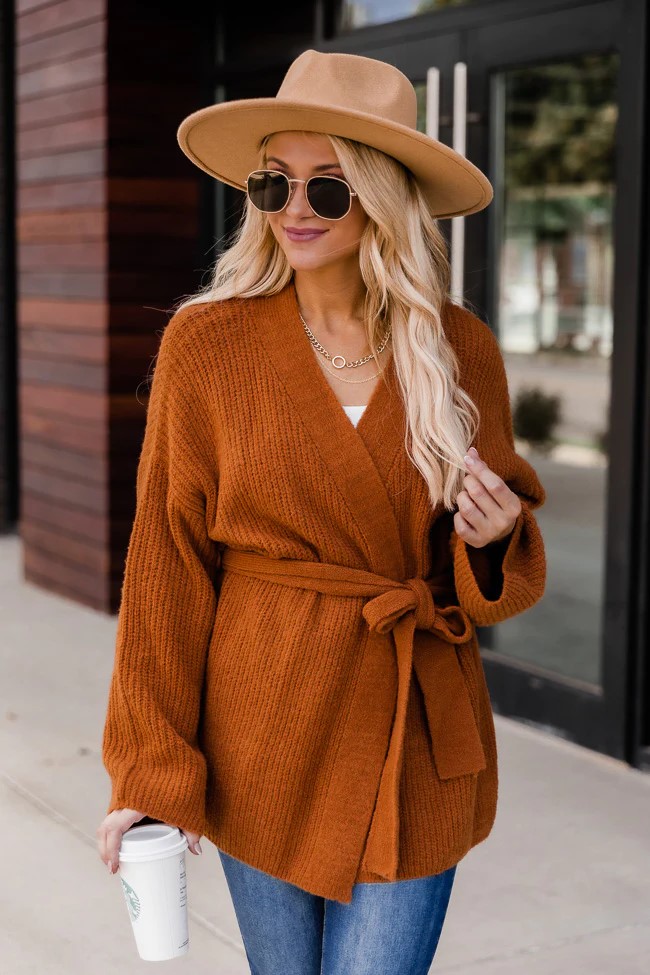 This camel wrap tie cardigan is made from stretchy ribbed knit fabric and features a relaxed shape long sleeves and a belted waist that you can adjust to your desired size.