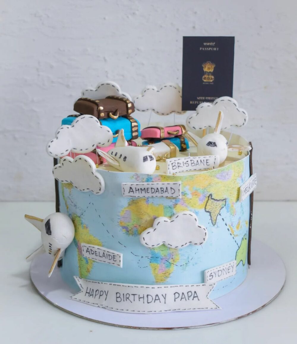 Give your dad a taste of the world with this beautiful blue adorned globe themed travel cake.