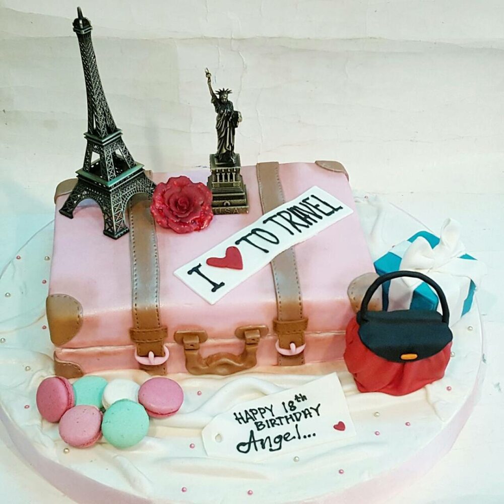 Send your traveller pal partner or family member out on their birthday with this I Love To Travel themed cake.