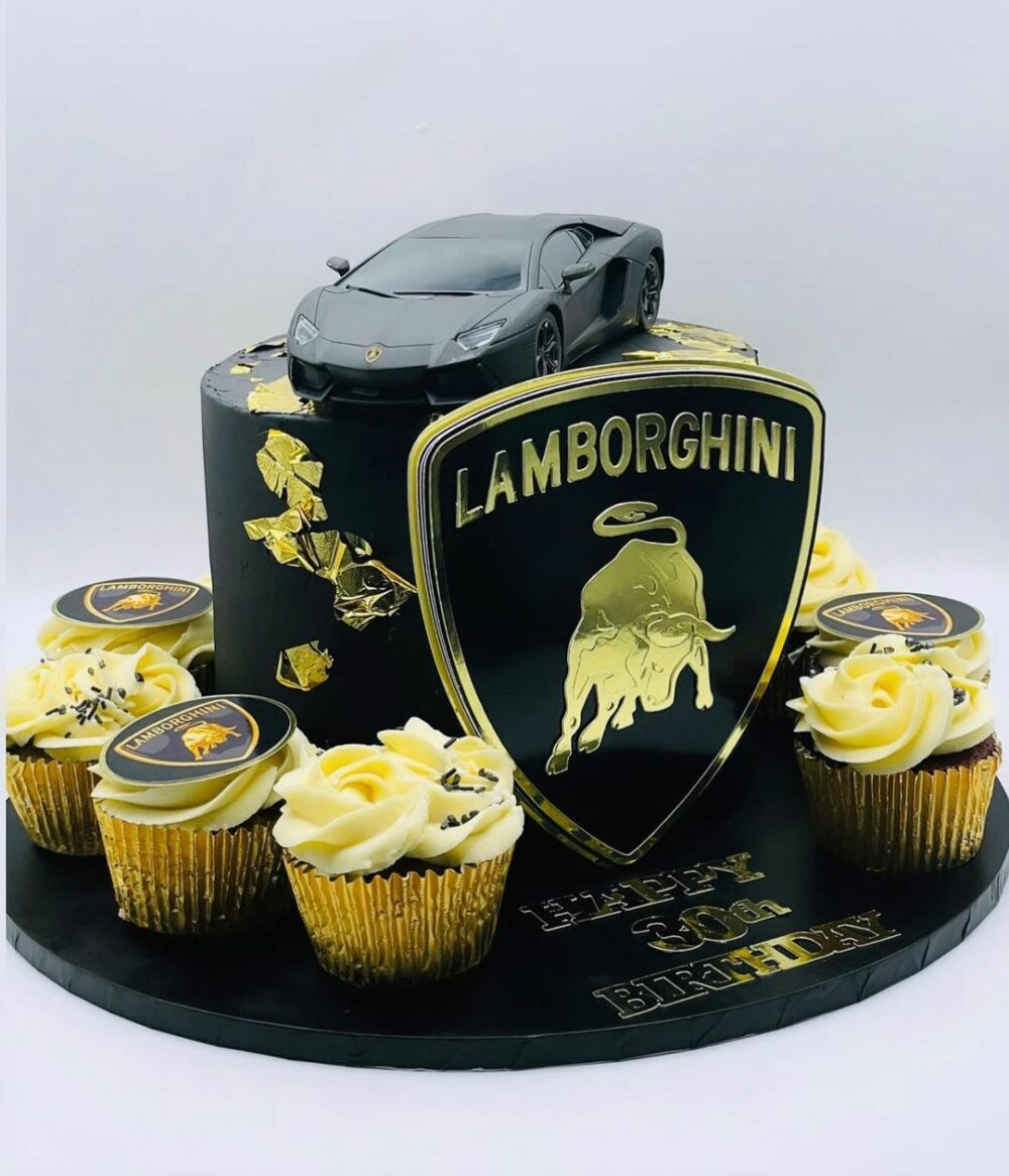 The luxurious traveler in your life would adore this black and gold Lamborghini car themed travel cake.