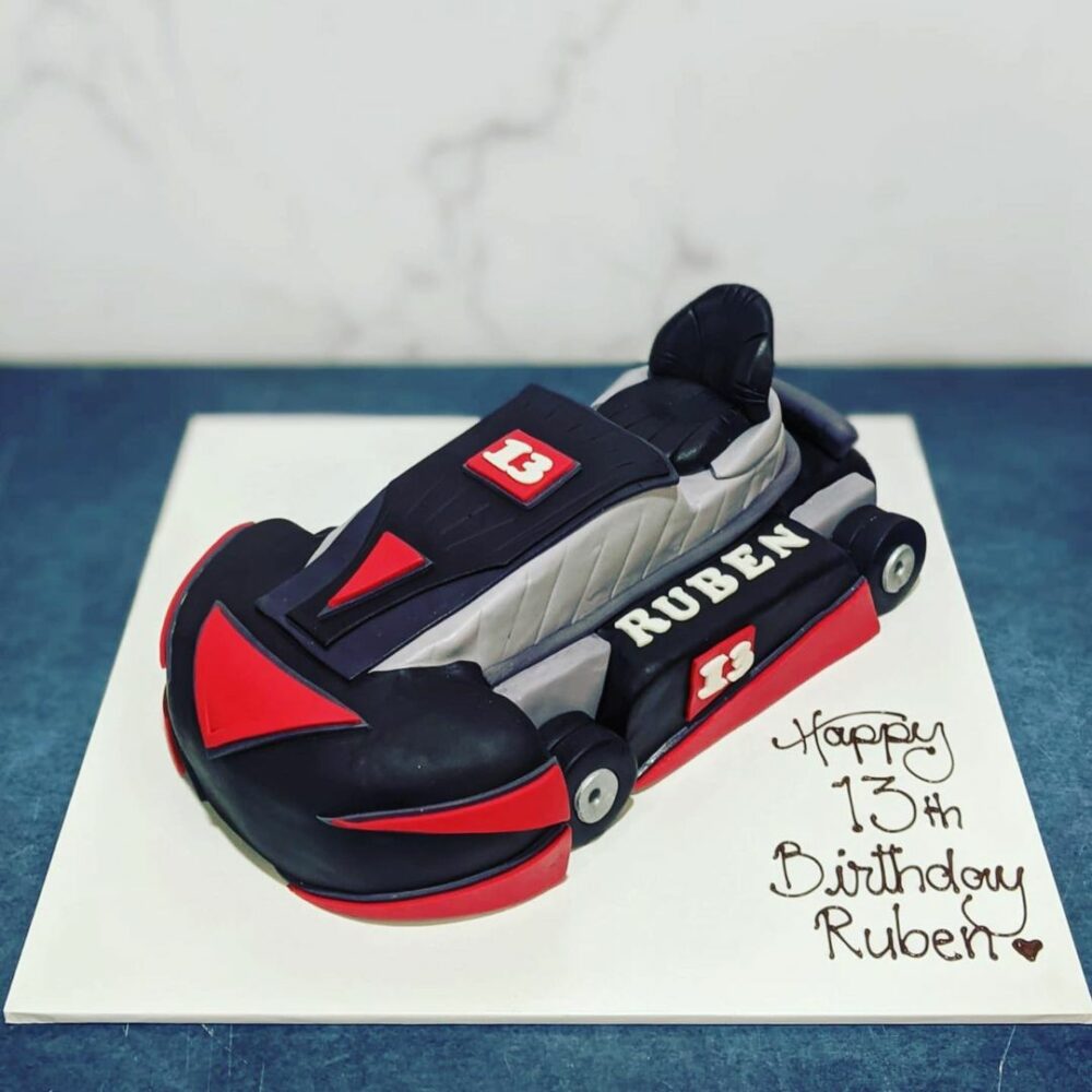 Those who have a passion for sports and adventure will adore this racing car cake.
