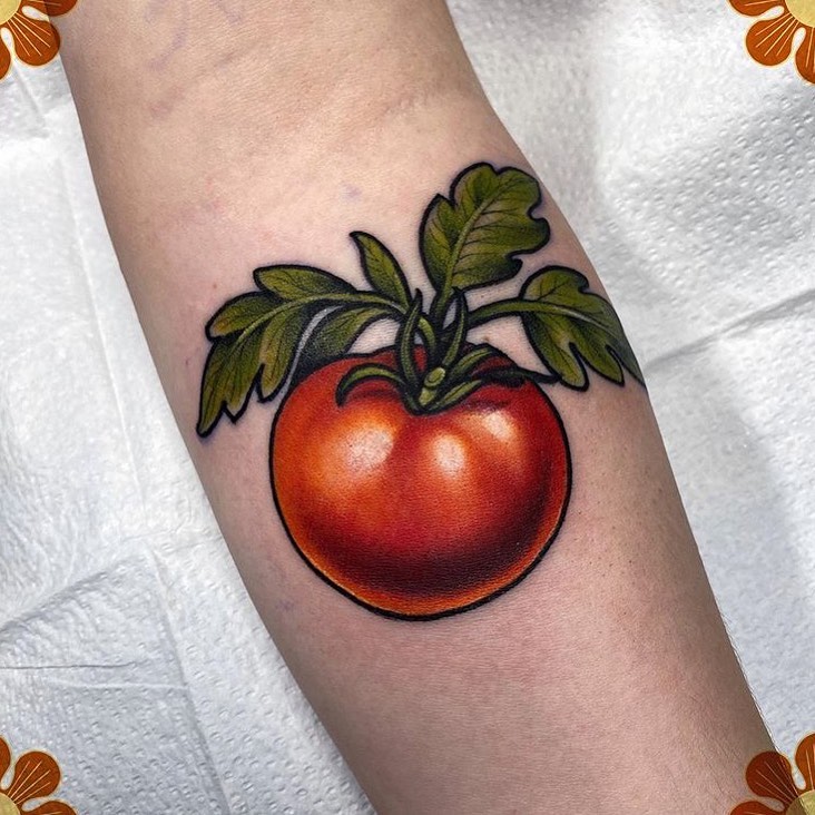 When it comes to food tattoos the representation of orange fruits is one that many people go for