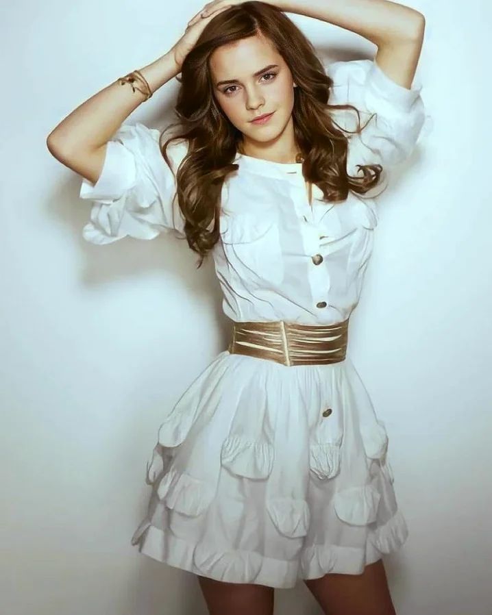 Emma Watson looks absolutely stunning in this simple yet stunning white minidress.
